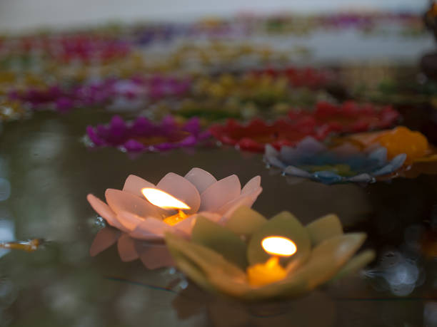 istock candle in glass lantern at the night. 671580160