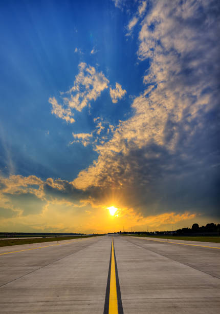 istock Airport runway on sunset 671602230