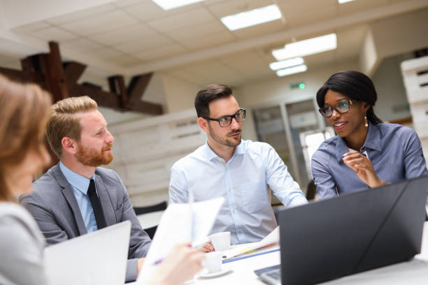 istock Business partners discussing documents and ideas at meeting 671602258