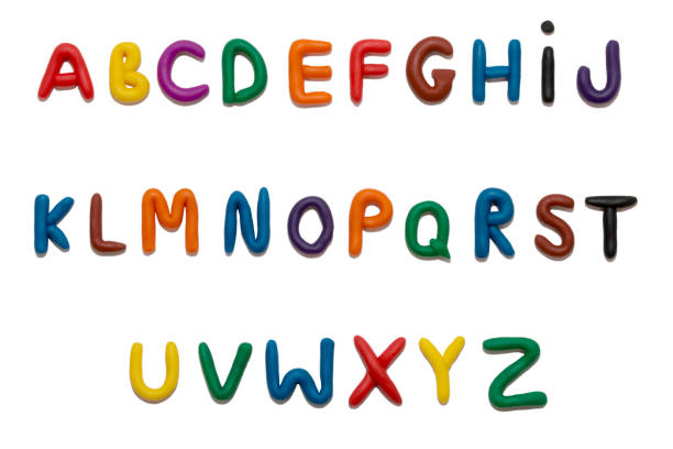istock Color plasticine alphabet, isolated 671607840
