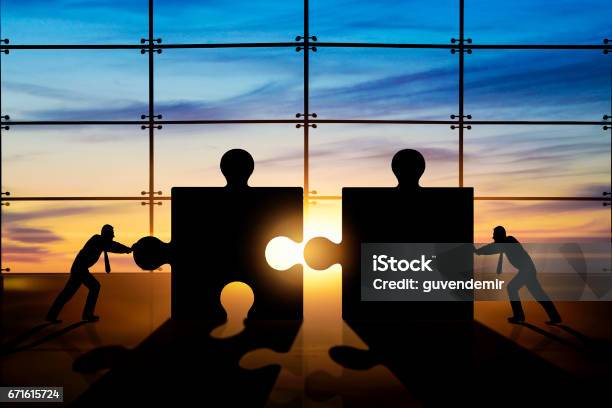 Business Teamwork Puzzle Pieces Stock Photo - Download Image Now - Mergers and Acquisitions, Concepts, Imagination