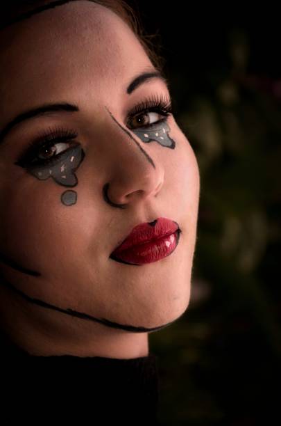istock Pretty young woman wearing creative makeup 671626114