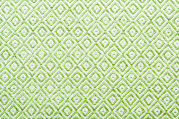 Linen napkin with a clear geometric pattern. Diamonds and squares. Background pattern.