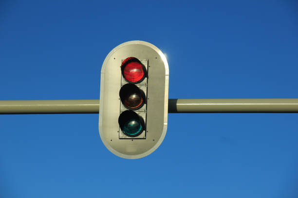 istock Traffic lights in a clear blue sky 671641460
