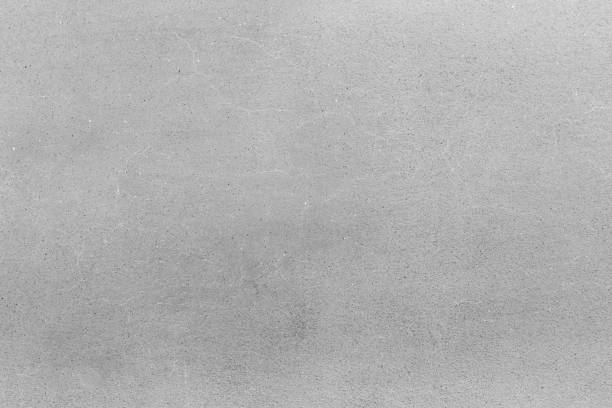Grey concrete or cement texture for background Grey concrete or cement texture for background gray background illustrations stock illustrations