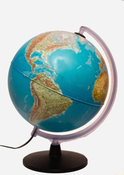 istock Old Style World Globe - Antique world globe isolated on white background.  Studio close up.  Showing Africa and some of Middle East. 671649208
