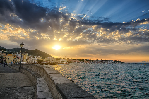 Evening cityscape of Ischia at sunset, town in the Metropolitan City of Naples, Italy