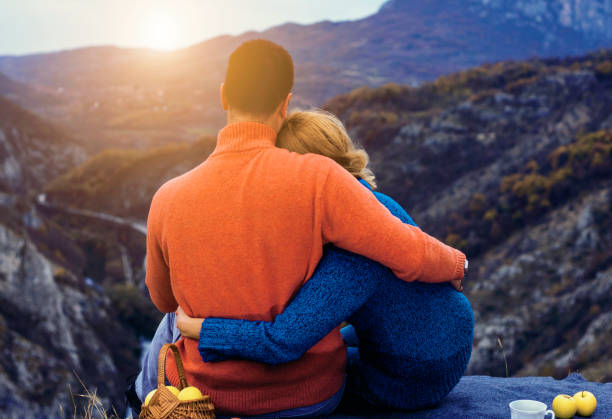 istock Couple resting on countryside 671667234