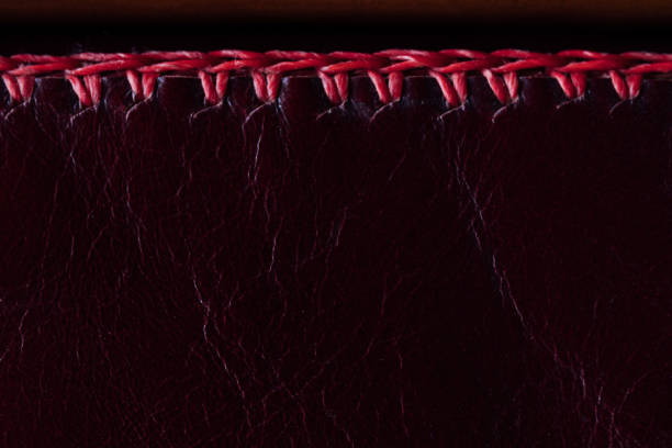 istock Macro fragment of a leather bag or purse. Handmade, texture background 671671440
