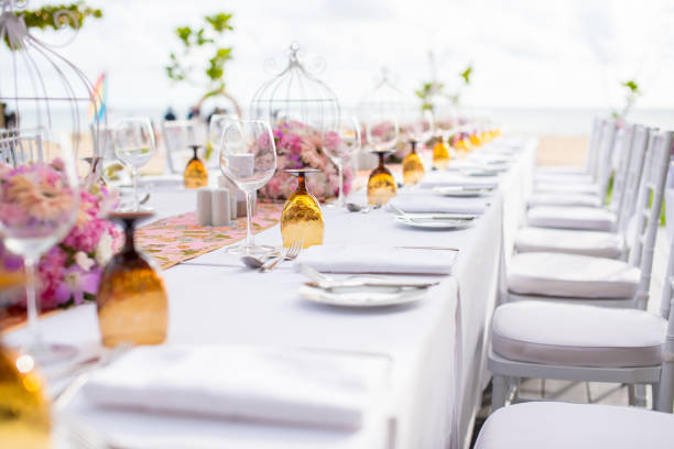 table setting at a luxury wedding and beautiful flowers on the table. - restaurant banquet table wedding reception imagens e fotografias de stock