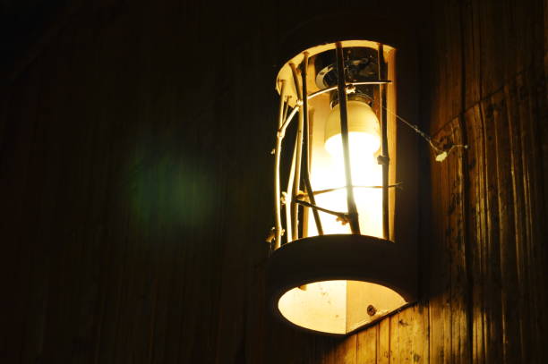 istock electric lamp hanging on bamboo wall 671682024