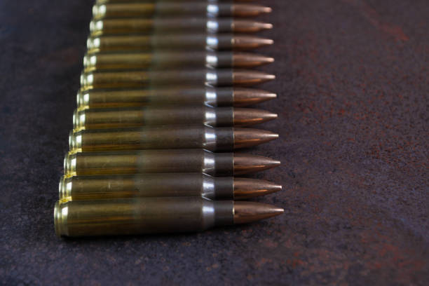 istock Group of  ammunition on a rusted metal background 671689832