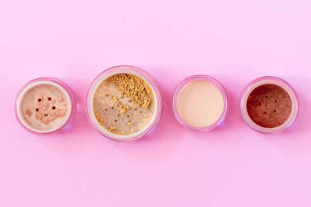 istock Mineral beauty makeup kit on pink 671695672