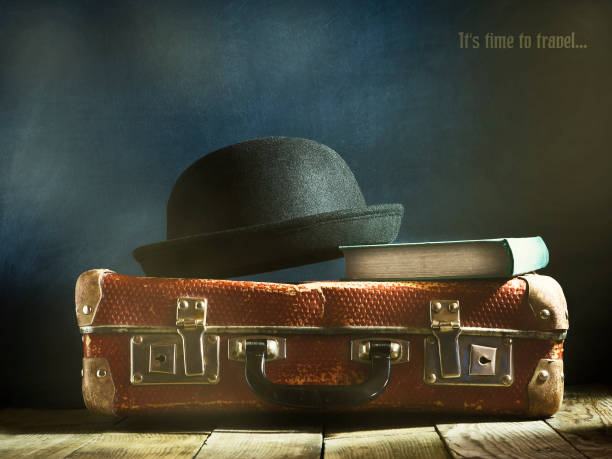 istock Old vintage suitcase on a wooden floor. 671699762