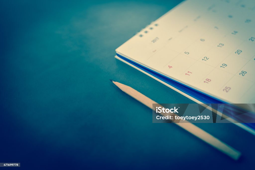 blurred calendar in planning concept on leather texture. Calendar Stock Photo