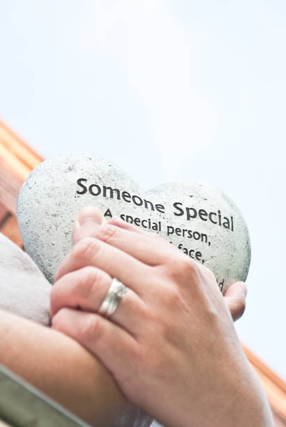 istock In memory of: Hand holding a 