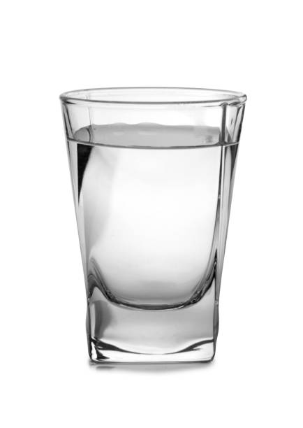 vodka in vetro vintage - shot glass foto e immagini stock