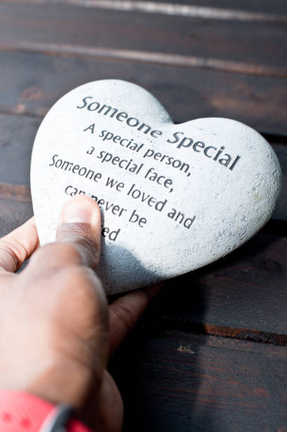 istock In memory of: Hand holding a 