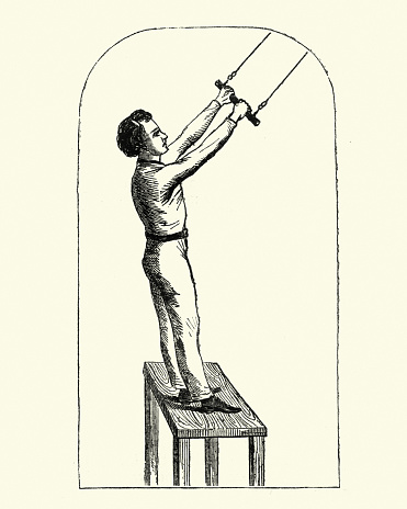 Vintage engraving of a Victorian boy abouit to use a trapeze