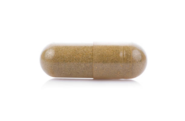 istock pills capsules isolated on white background 671720070