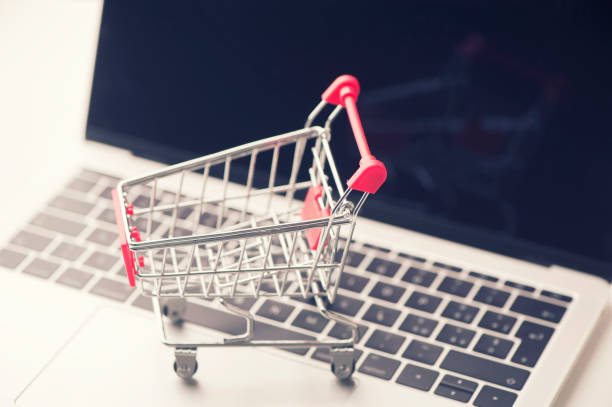 istock Shopping basket on a laptop 671720946