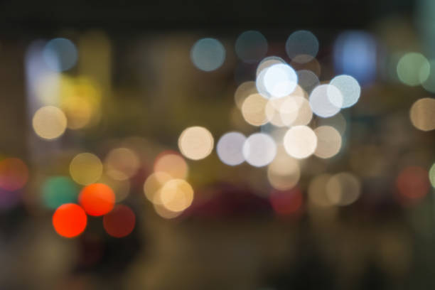 istock Night city street lights bokeh background 671721048