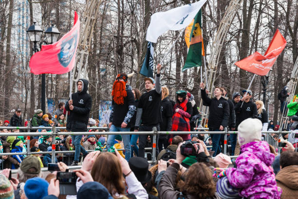 St Patrics Day Parade in Moscow MOSCOW, RUSSIA - MARCH 18, 2017. 25th St. Patric Day parade takes place in Sokolniki park of Moscow as part of the Irish Week 2017 festival. All six Moscow traditional Irish pubs on the catwalk. irish punt note stock pictures, royalty-free photos & images