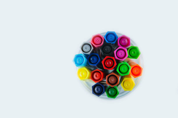 istock Top view of many different colored pens  isolated on white background 671727500