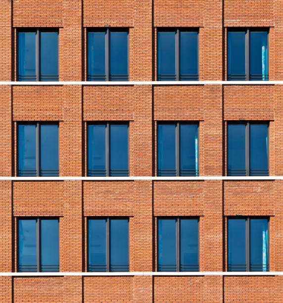 istock facade of modern bulding with windows 671727630
