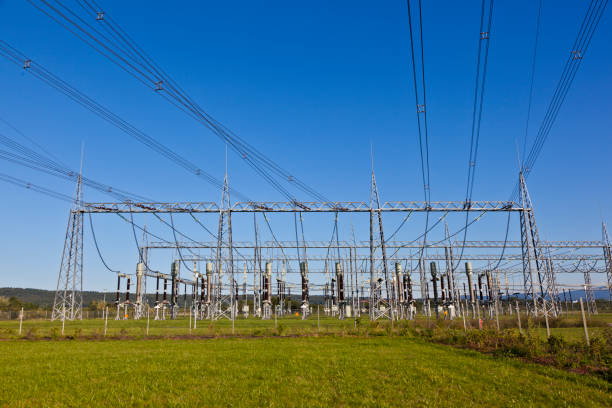 istock electrical power plant in farmland area 671728078