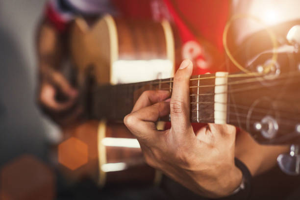 hand of man in classical guitar