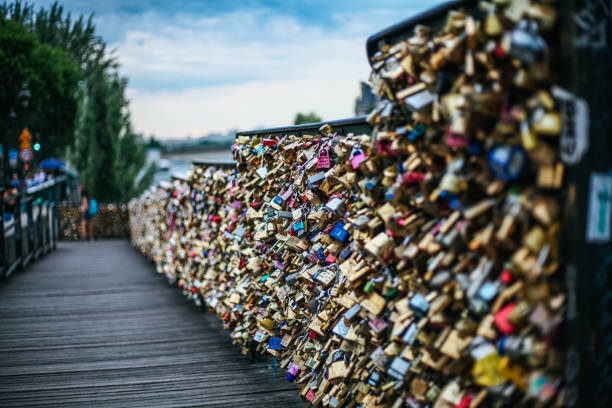 Paris, France - 28 June 2016: The Pont des Arts bridge in Paris is famous for the love locks
