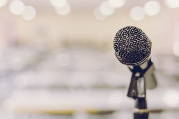 istock Microphone in Conference Seminar room Event Background 671737530