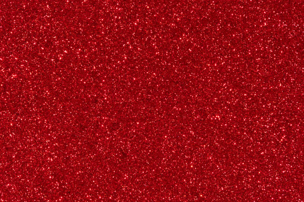 fondo abstracto de textura de brillo rojo - purpurina fotografías e imágenes de stock