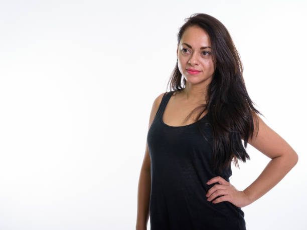 istock Studio shot of beautiful woman thinking while posing against white background 671741264