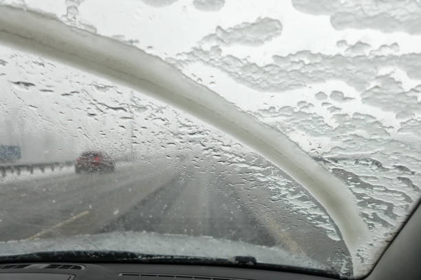 istock View of the road in wet snow. 671744832