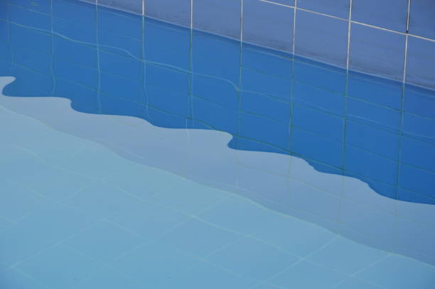 reflection of water wave ripple on pool stock photo