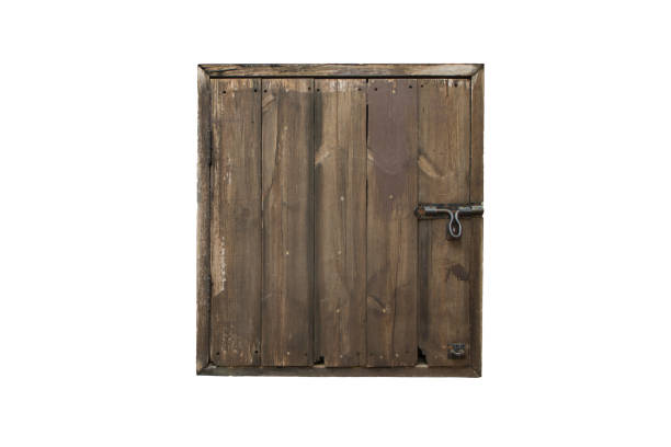 Rustic wooden door with metal hardware details in vertical format