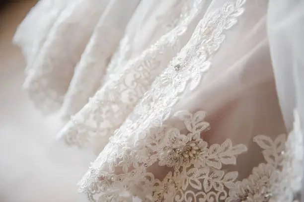 Wedding Dress. A close picture. Embroidery on the dress.