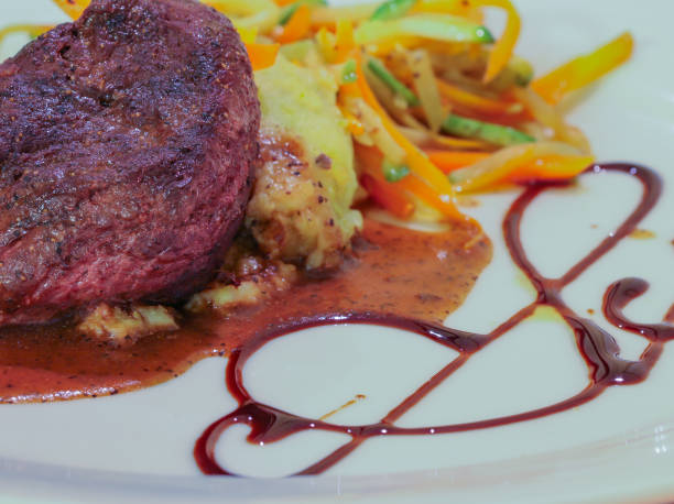 istock Beef steak red wine sauceand vegetables. 671757806