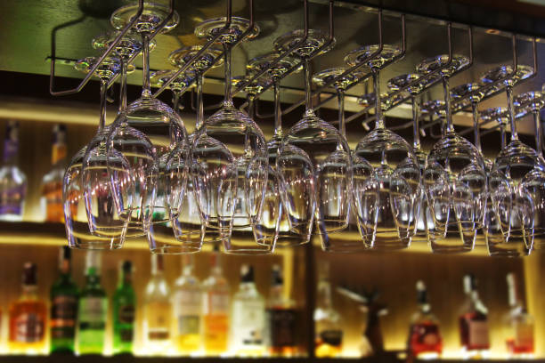 istock Glasses and bottles on the bar before the party 671760696