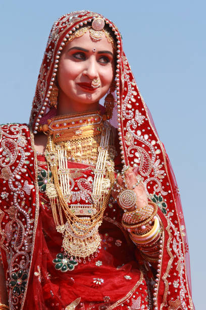 JAISALMER, INDIA - FEB 01: An unidentified traditionally dressed Rajasthani woman participates in a cultural show as part of Desert Festival held on February 01, 2015 in Jaisalmer, Rajasthan, India.