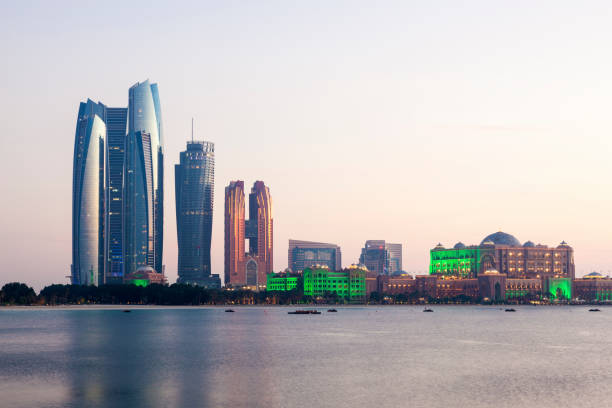 istock Abu Dhabi skyline at dusk, UAE 671763592