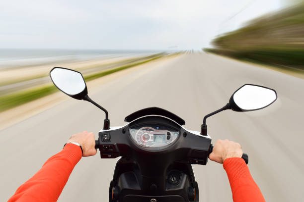 istock The man  is riding a  scooter 671773386