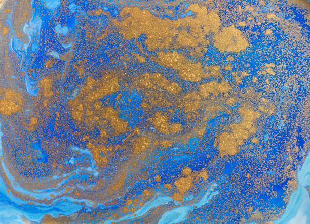 istock Blue and golden liquid texture. Watercolor hand drawn marbling illustration. Ink marble background. 671776438