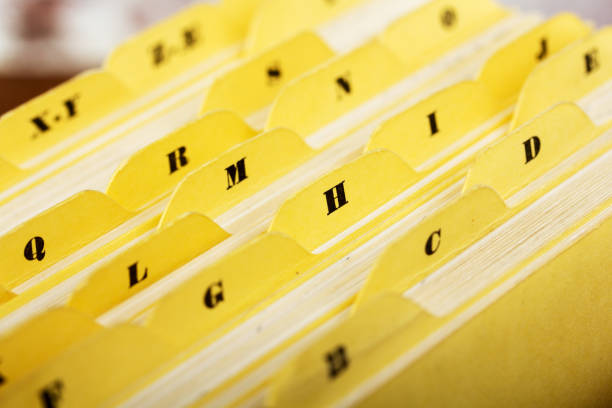 istock Close up of alphabetical index cards in box 671787012