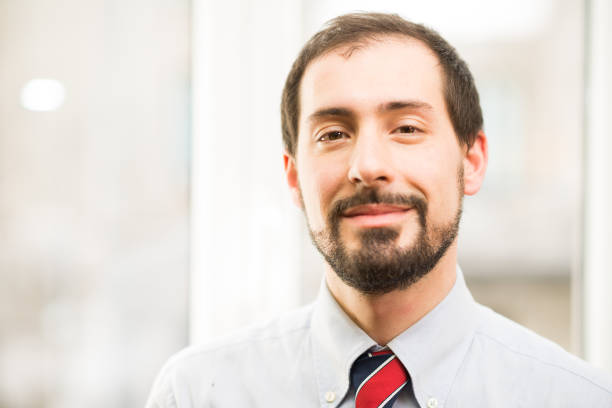 istock Friendly businessman portrait 671792968