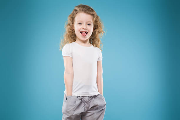 istock Beauty young girl dressed in white 671793180