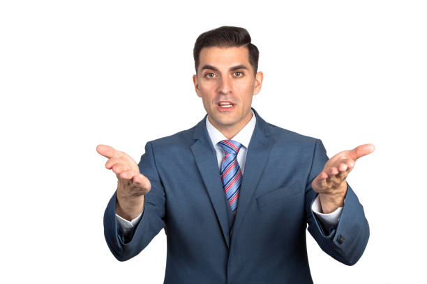 istock Young Businessman in Suit looking at camera gesturing with PATH 671798822