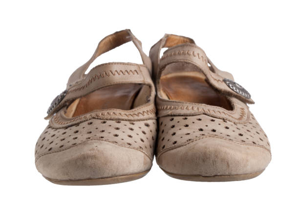 istock Old women's shoes on white front view 671799604